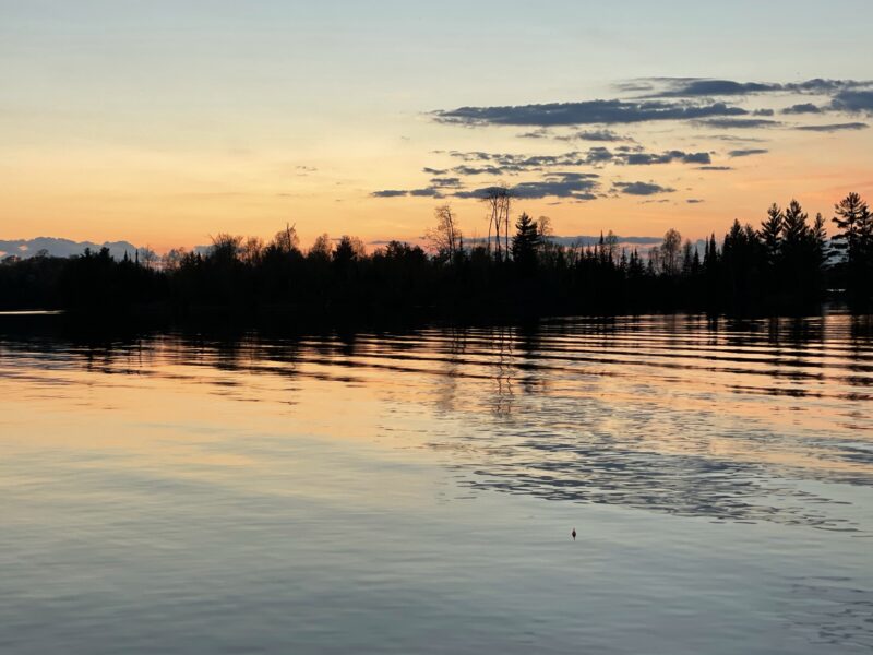 Sunset over Island Lake during a family fishing trip