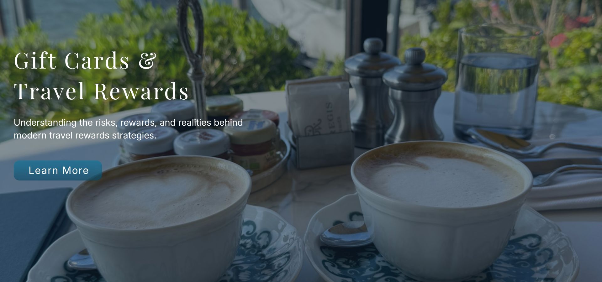 Gift cards and travel rewards strategy banner with coffee and waterfront travel imagery.