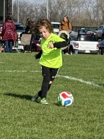 Youth soccer player during a family sports travel trip