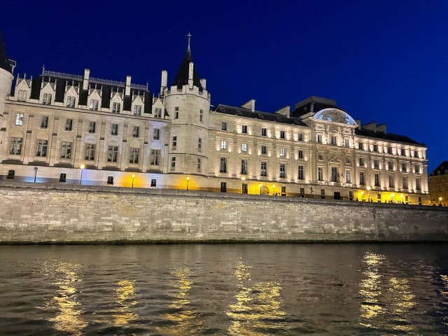 Seine River sunset cruise in Paris representing bucket-list travel experiences