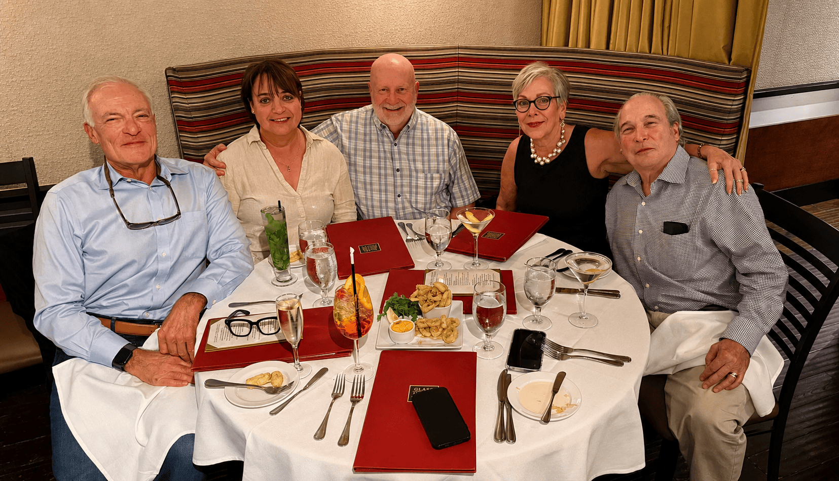 Family gathered together for dinner during a meaningful trip