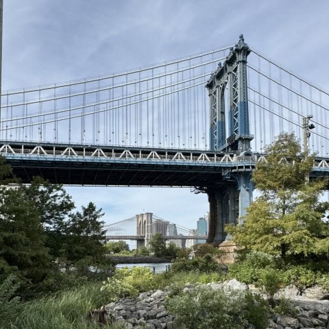 View of the Manhattan Bridge from DUMBO in Brooklyn during a points-and-miles trip to New York City