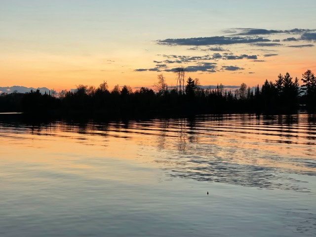Peaceful fishing scene in northern Minnesota showing that travel rewards can support simple meaningful getaways