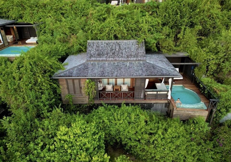 Aerial view of a Hillside Garden Pool Villa at Hermitage Bay Antigua featuring a private plunge pool surrounded by lush tropical vegetation.