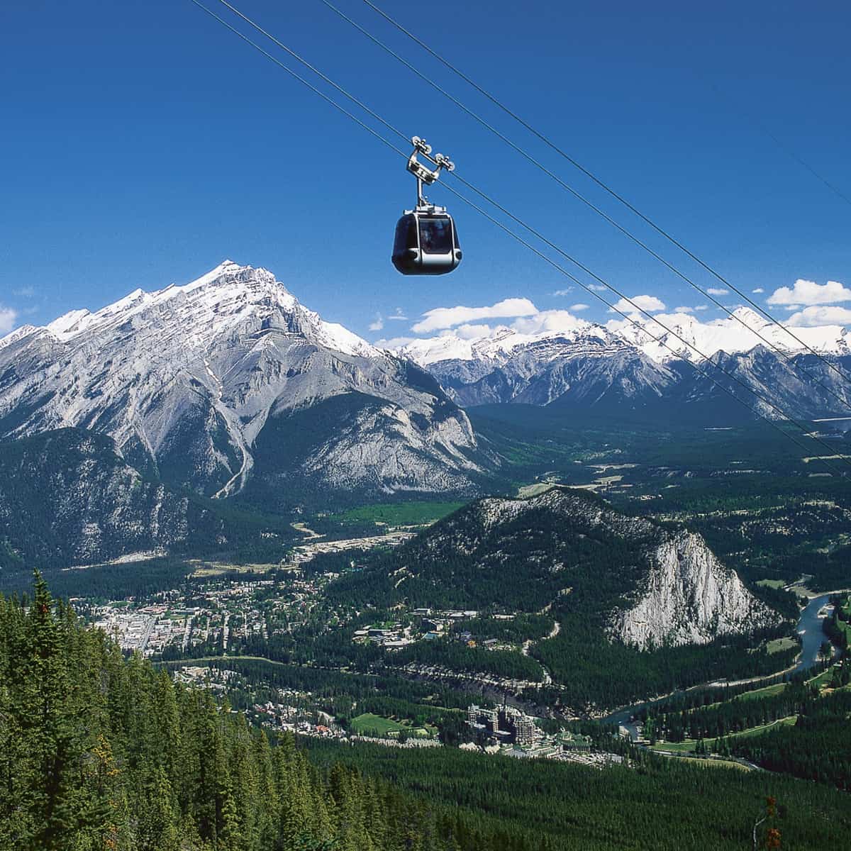 Banff Gondola ascending Sulphur Mountain above Banff National Park in Alberta, Canada.