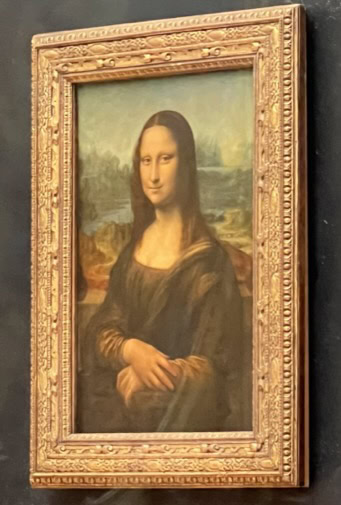 Mona Lisa painting by Leonardo da Vinci displayed in the Louvre Museum in Paris, France