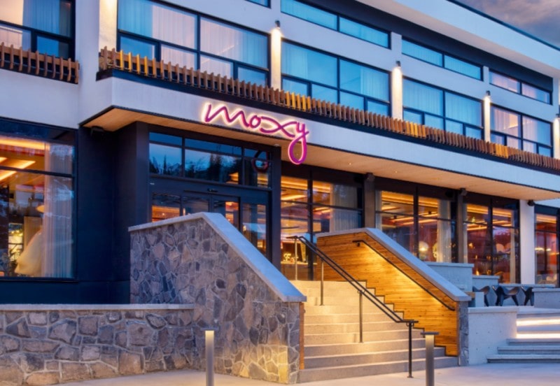 Exterior of the Moxy Banff hotel, where Marriott free night certificates were redeemed for a peak summer stay in Banff National Park.