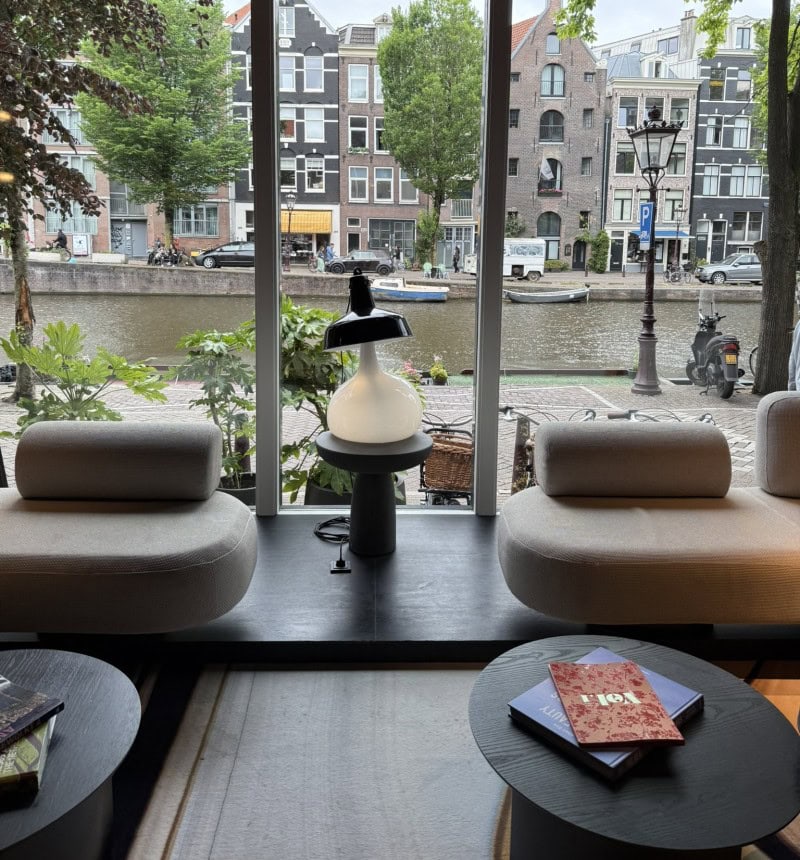 Canal view from the Andaz Amsterdam lounge representing hotel planning and location-focused travel research