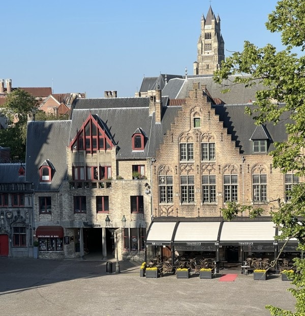 Historic medieval buildings overlooking Market Square in Bruges, Belgium