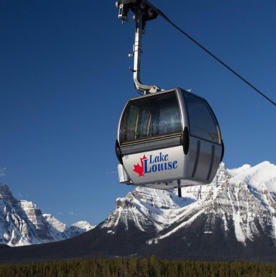 Lake Louise Gondola rising above the Canadian Rockies near Banff National Park in Alberta, Canada.