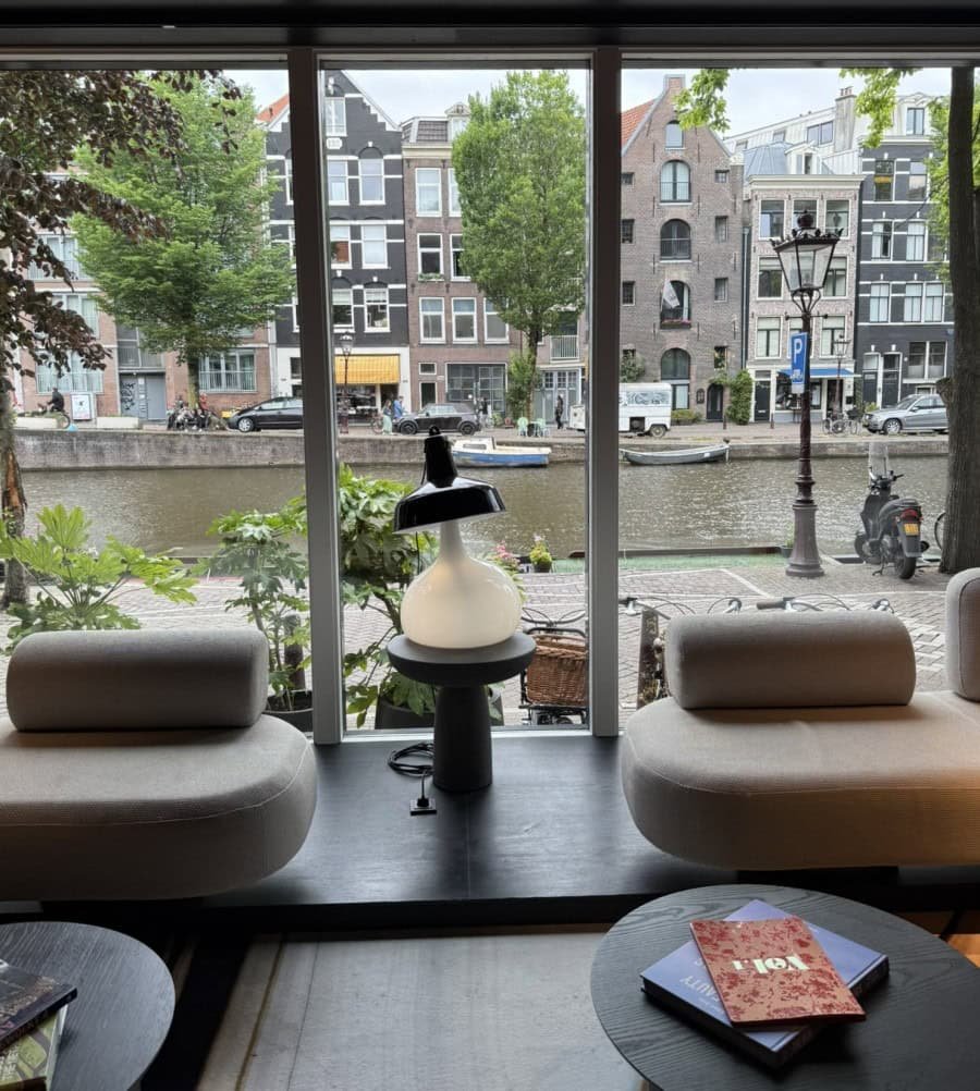 View from a hotel overlooking one of Amsterdam's historic canals, highlighting the value of choosing accommodations with a memorable location.
