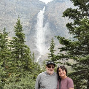 Couple at Takakkaw Falls in Yoho National Park on Day 1 of our Canadian Rockies itinerary