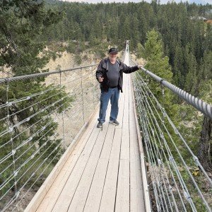 Randy crossing the Golden Skybridge suspension bridge on Day 2 of our Canadian Rockies itinerary