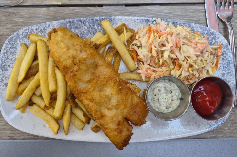 Fish and chips with fries and coleslaw at The Maple Leaf in Banff