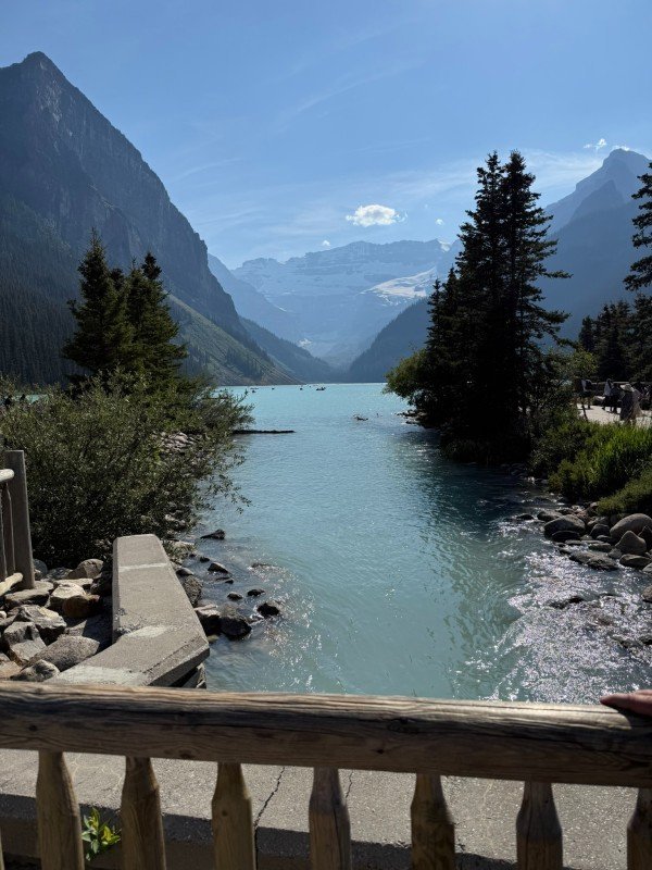 Lake Louise lakeshore with turquoise water and mountain views