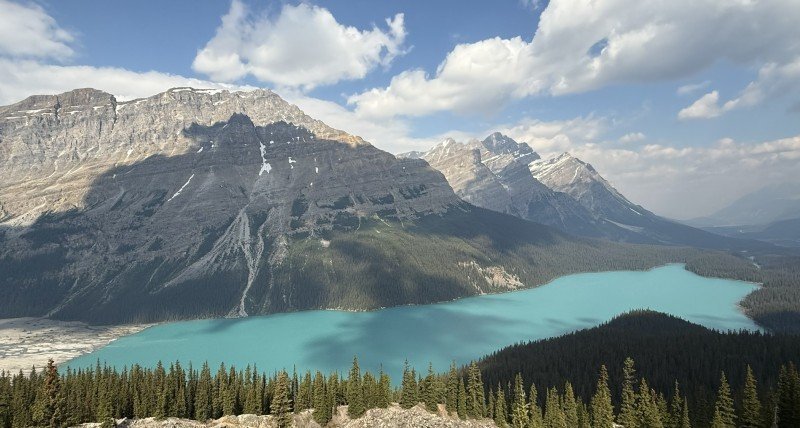 Cloud shadows over turquoise Peyto Lake and the Canadian Rockies